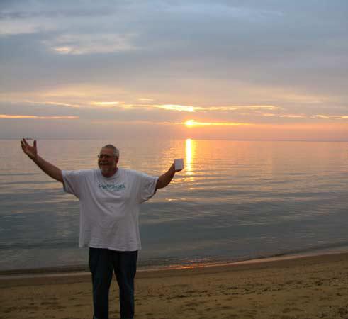 Comber Curt celebrating a Chesapeake Bay dawn